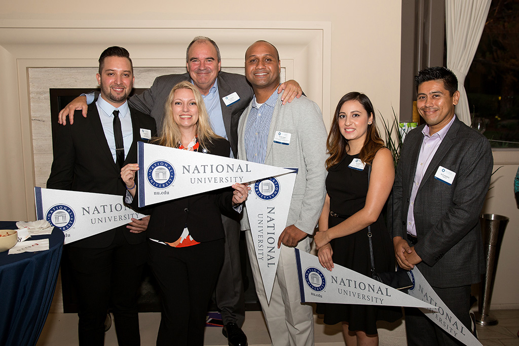 President Andrews with Patricia Cardoza, Associate Director, NU Scholars Program and some of our esteemed NU Scholars