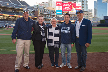 Chancellor Cunningham, President Andrews and Dr. Judy Mantle, dean of SCOE pose with NU alumni at Teacher Appreciation Night.