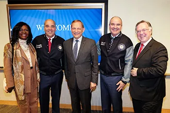 Members of the Board of Trustees and Chancellor Cunningham welcome NU President Dr. David Andrews in April 2016.