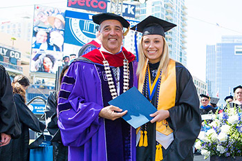 Chancellor Cunningham with his daughter Tressa Cunningham, who earned a master’s degree at NU.