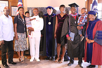 President Andrews and SHHS Dean Gloria McNeal at a special ceremony for graduate, Francis Oladipo, who serves with the U.S. Navy.