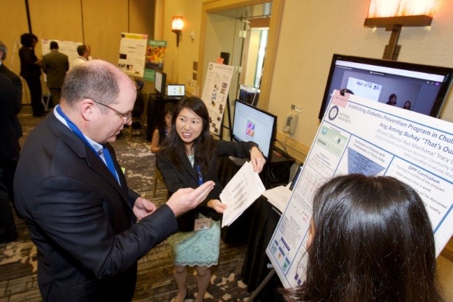 Students presenting their project to faculty judges at the 2017 Student Scholarship Conference