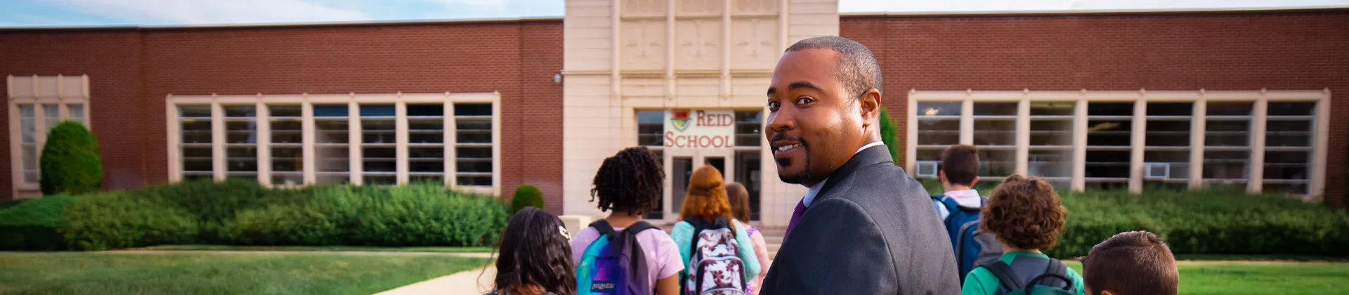 Prince M. smiles over his shoulder. NU offers a scholarship for Small School
District Association member employees.