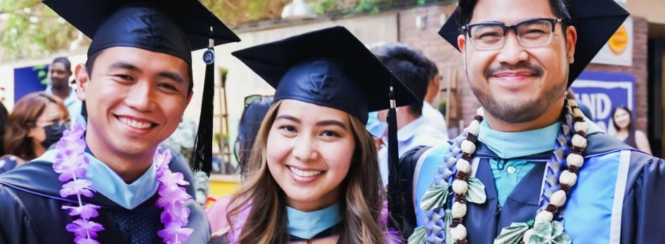 3 people at 2021 commencement