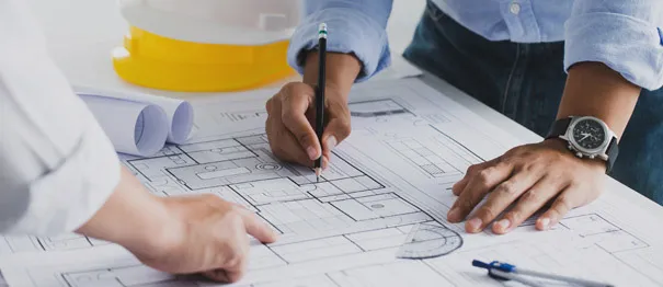 woman smiling at man taking notes