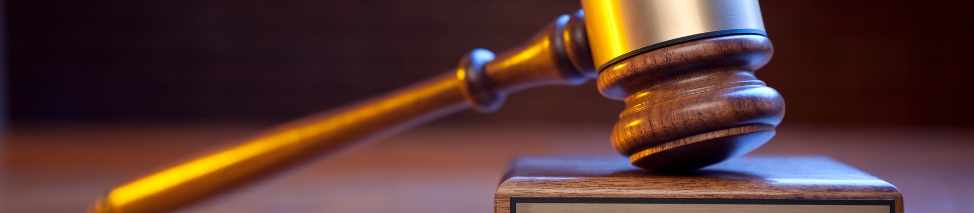 a picture of a gavel in a courtroom