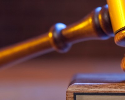 a picture of a gavel in a courtroom