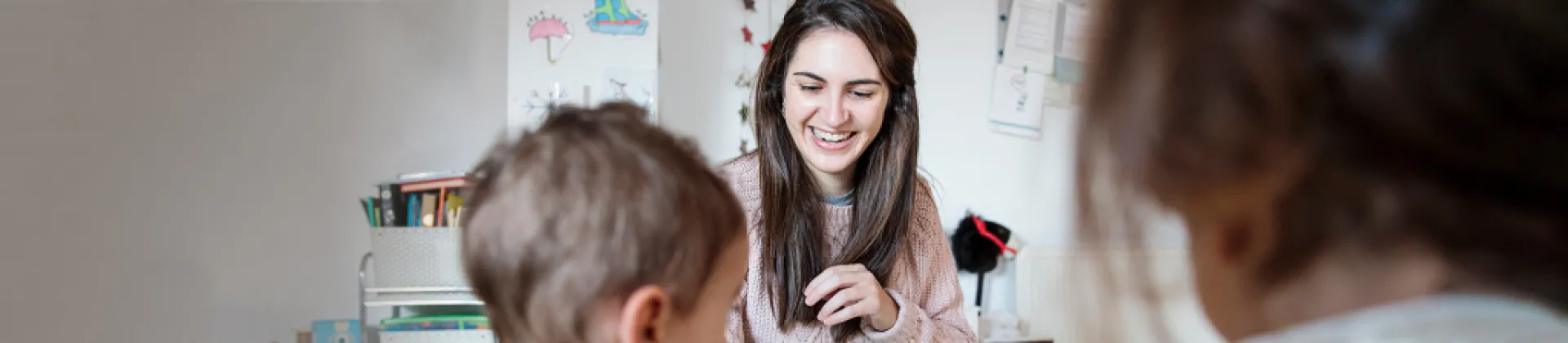 Teacher in class with children