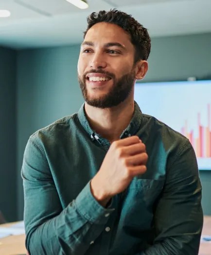 guy with beard in green longsleeve button up shirt