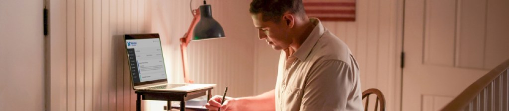 military member working on computer