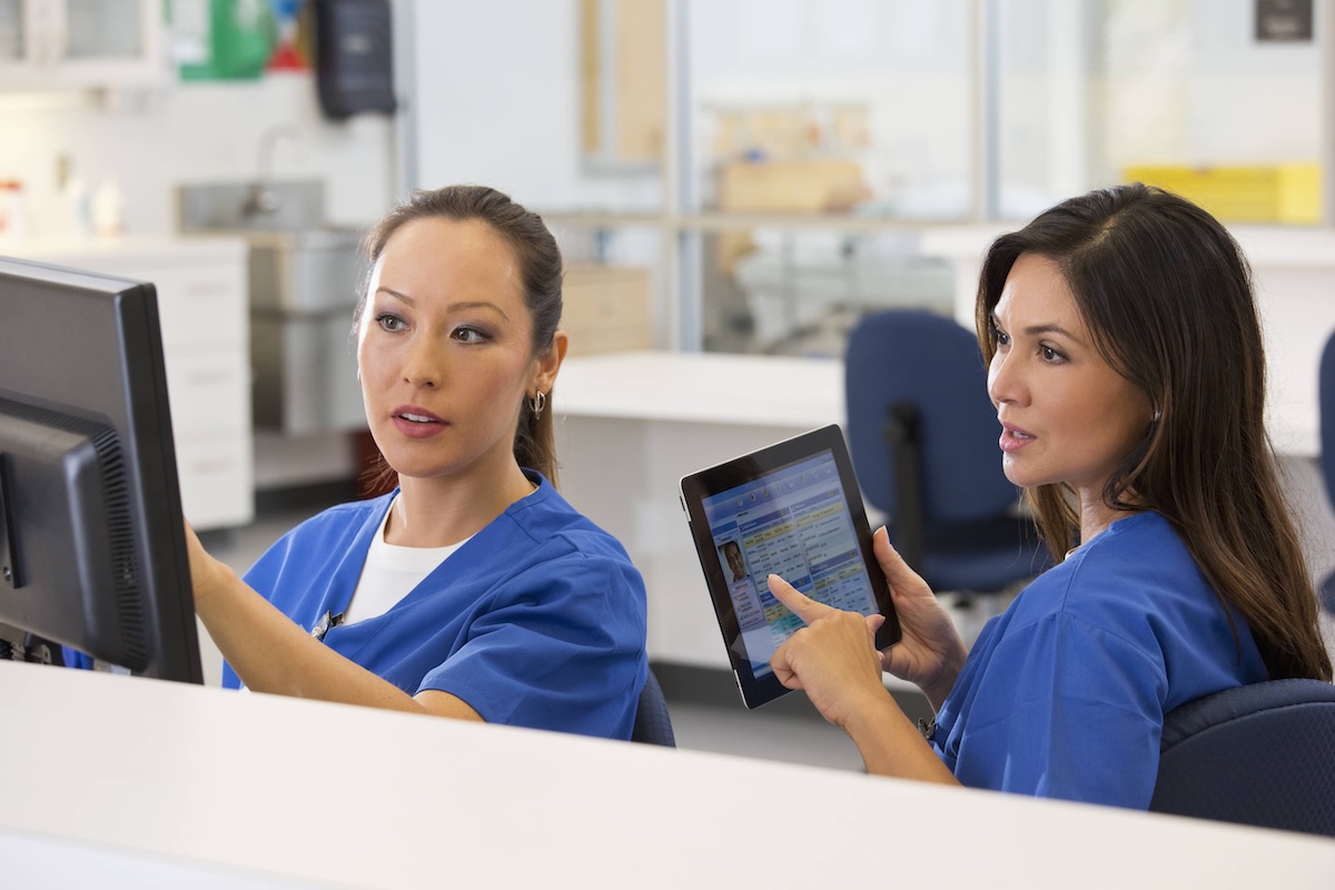 nurses at computer