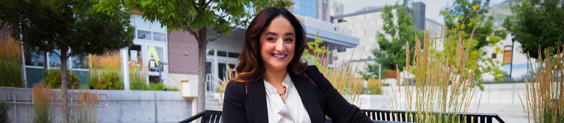 woman sitting outside on bench
