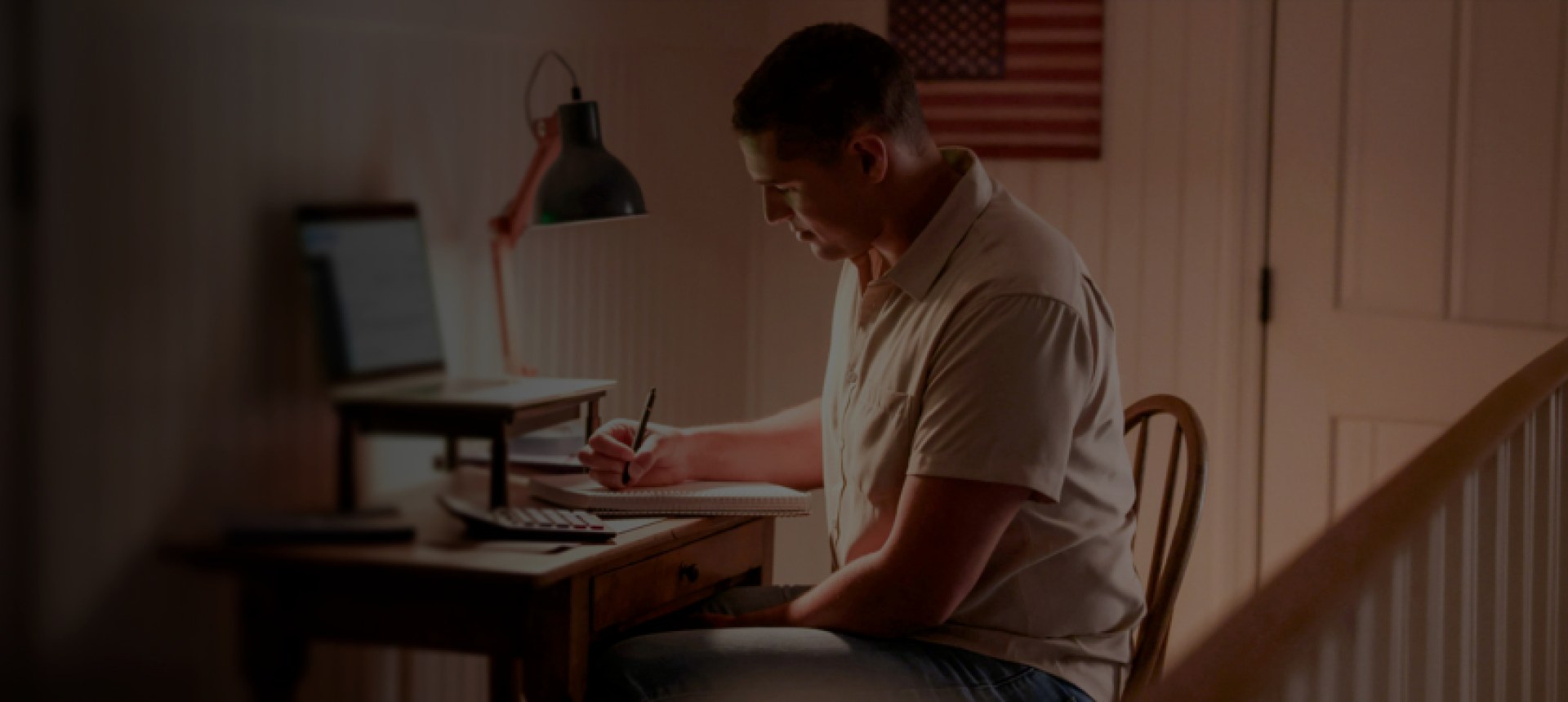 military veteran working on schoolwork at desk